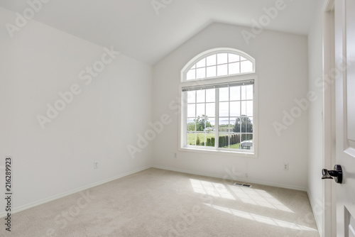 Empty room with pure white walls. © Javani LLC