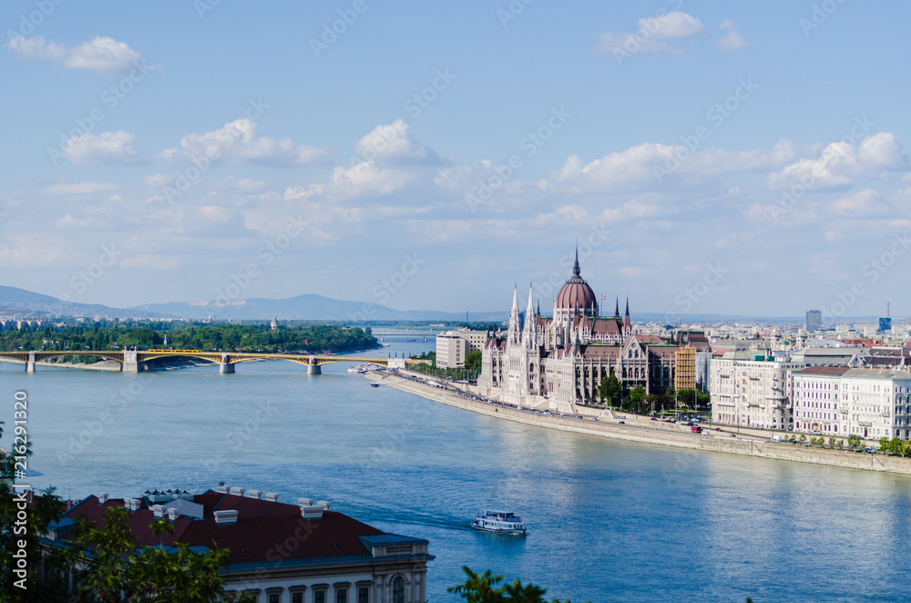 Cityscape of central Budapest with parliament building, Danube river and Sziget park.