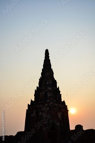 Sunset through pagoda in wat chai watthanaram, Ayutthaya, Thailand