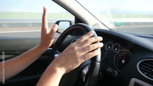 Wallpaper Mural Man drives the car on highway rap hand on the steering wheel listen to music Torontodigital.ca