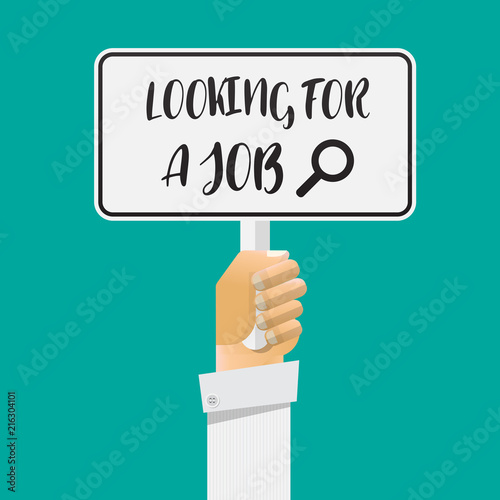 Hand holding looking for a job sign.