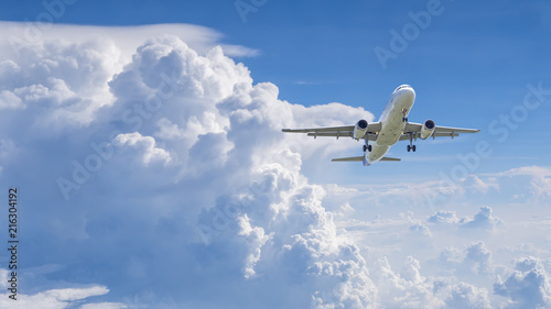 Airplane flying under blue sky 8