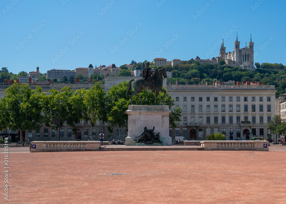 The Bellecour square in Lyon with a statue of Louis XIV in France