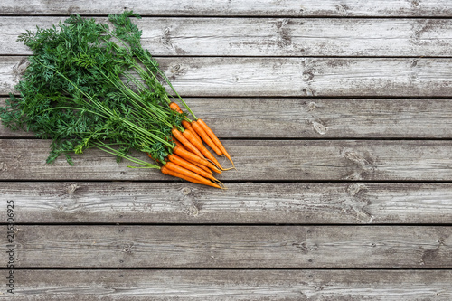 Bundle of carrots on a rust...