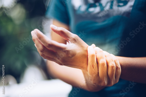 Close up woman with wrist pain
