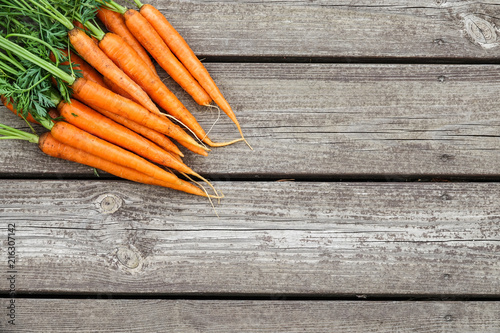 Bundle of carrots on a rust...