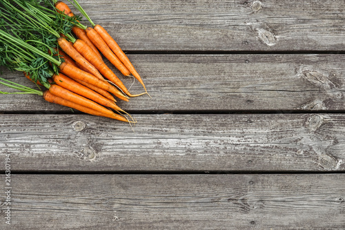 Bundle of carrots on a rust...