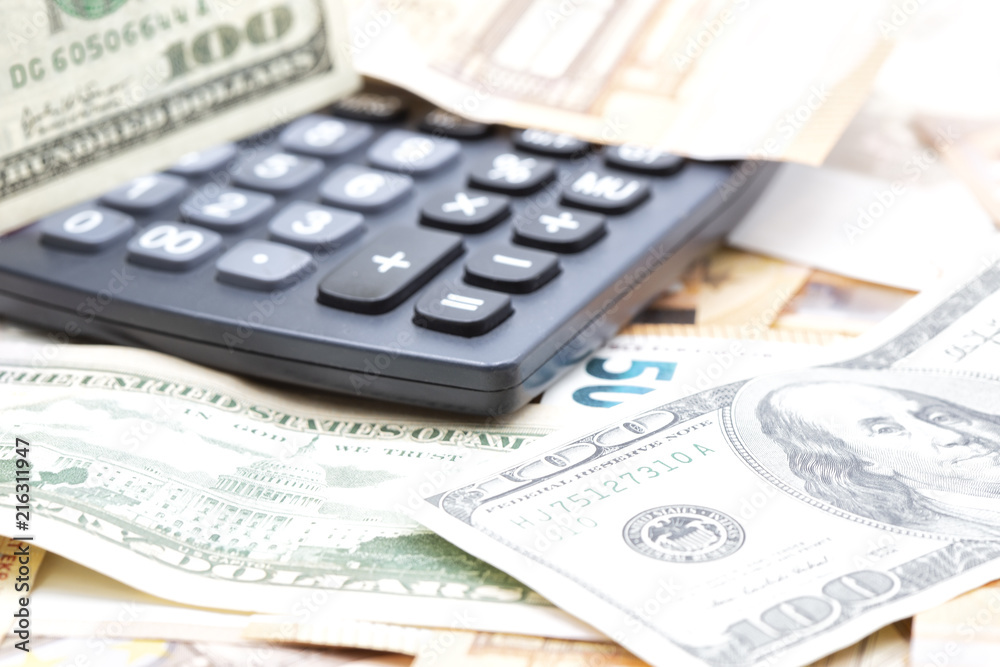 blurred dollar and euro calculator money background blurred dollar and euro calculator money background