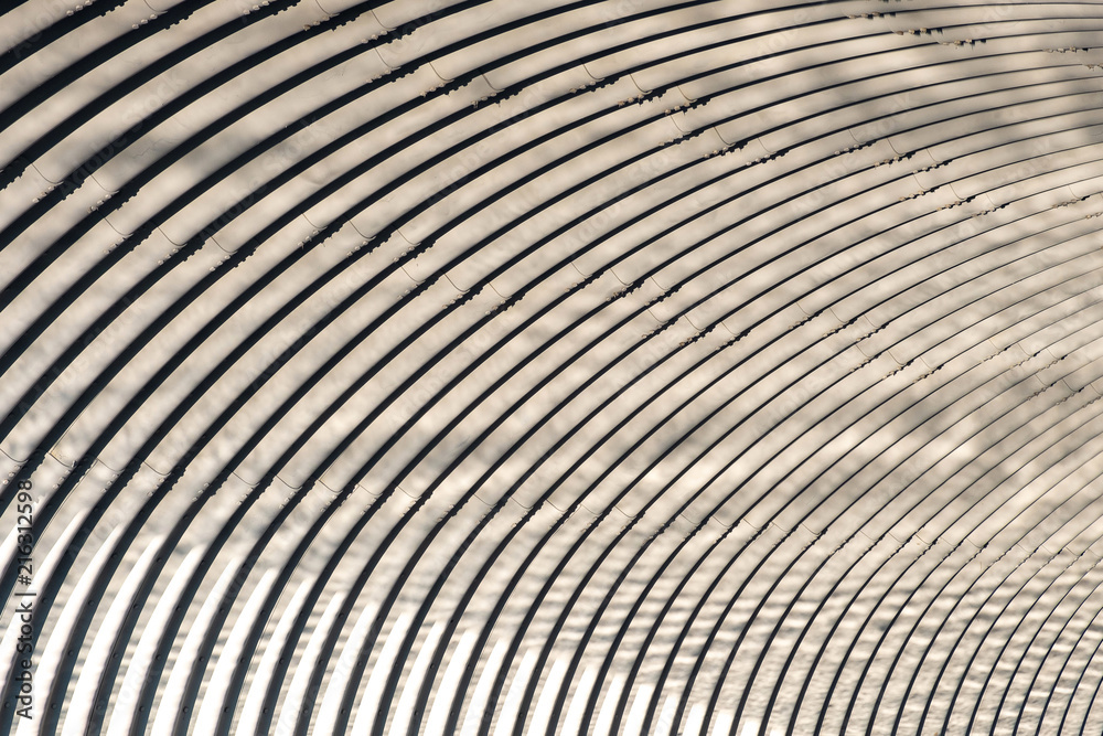 round lines on metal corrugation, abstract lines of a tempered character round lines on metal corrugation, abstract lines of a tempered character