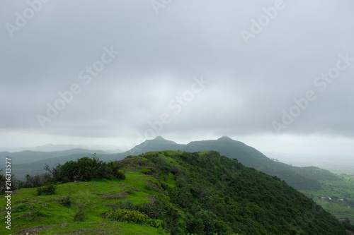 Lush green monsoon nature landscape mountains, hills, Purandar, Maharashtra, India