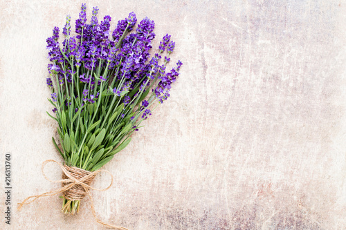 Fototapeta Naklejka Na Ścianę i Meble -  Lavender flowers, bouquet on rustic background, overhead.