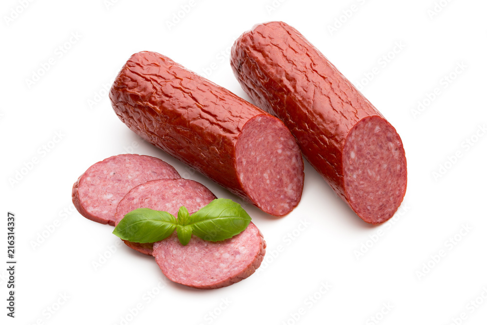 Salami smoked sausage, basil leaves on white background cutout. Salami smoked sausage, basil leaves on white background cutout.