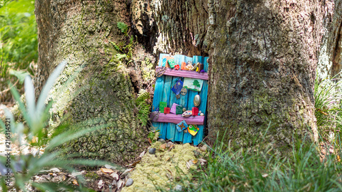Decorated fairy door in a tree