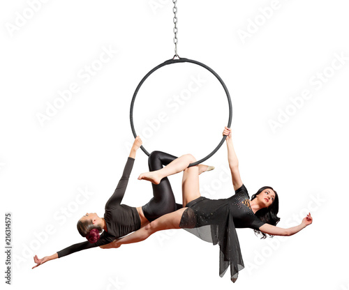 Obraz na plátně Women doing gymnastic exercises on the hoop