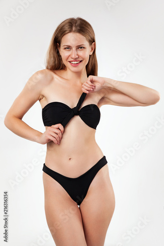 Beautiful woman in black bikini