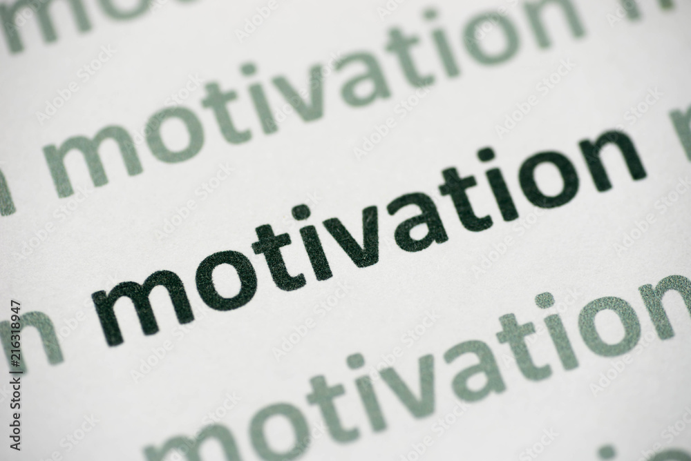 word motivation printed on paper macro word motivation printed on paper macro