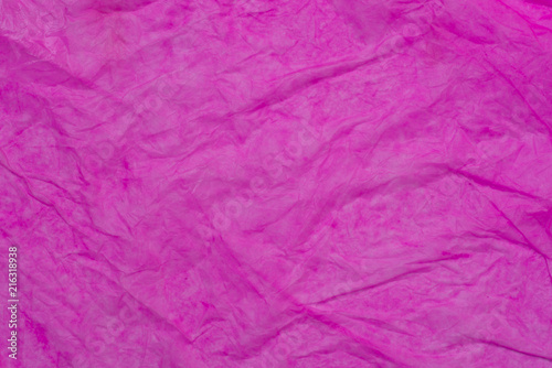 pink wet creased paper tissue texture background
