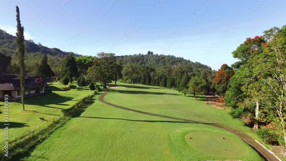 One shot aerial of Hole 1 of the Handara Golf Course in Bedugul Bali Indonesia