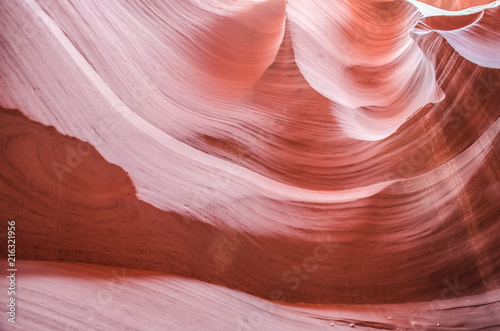 Pink peach wave shapes photographed at slots canyons in Arizona