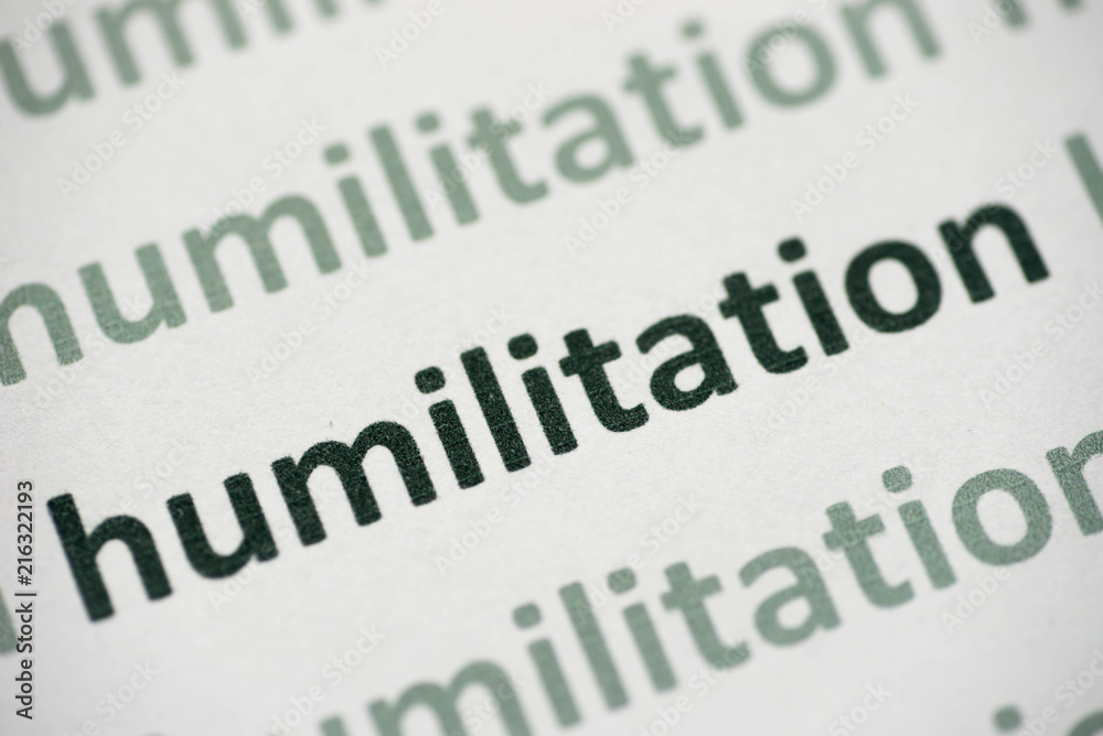 word humilitation printed on paper macro word humilitation printed on paper macro