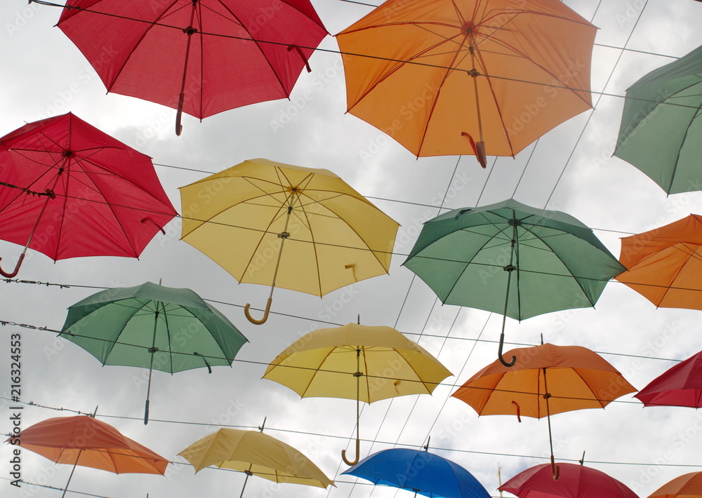 Obraz premium Lots of umbrellas in the sky.