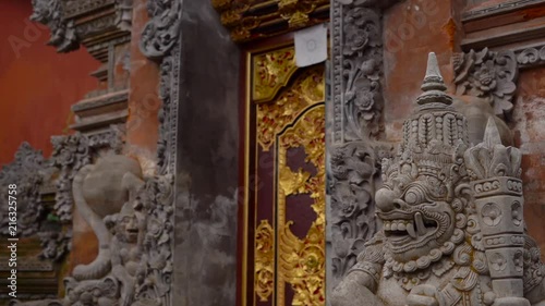 Slowmotion steadicam shot of the Puri Saren Royal Palace, Ubud. Bali photo