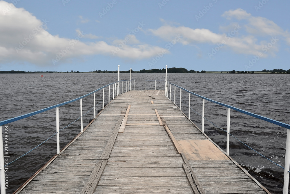 Boat pier on the river Sheksna