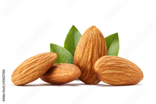 Close-up of almonds with leaves, isolated on white background