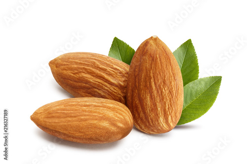 Close-up of three almonds, isolated on white background