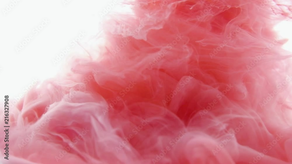Red and White color paint ink drops in water slow motion video white background with copy space. Inky cloud swirling Abstract isolated smoke explosion Red and White color paint ink drops in water slow motion video white background with copy space. Inky cloud swirling Abstract isolated smoke explosion
