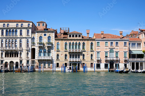 Venice ancient buildings facades and the grand canal in a sunny day in Italy © andersphoto