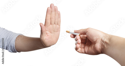 Hand refusing a cigarette offer, isolated on white background