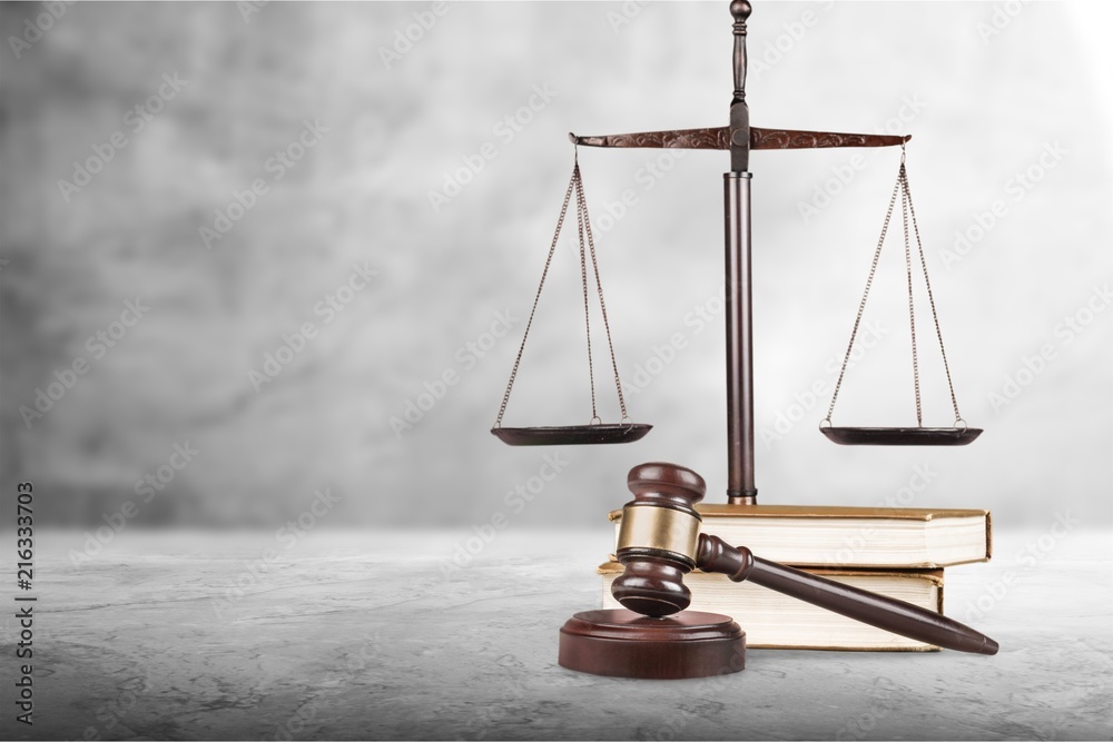 Justice Scales and books and wooden gavel