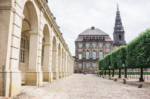 Christiansborg Palace in Copenhagen, Denmark. It's a palace and government building on the islet of Slotsholmen. Gallery of arches and columns adjacent to the Christiansborg Riding Grounds and the Roy