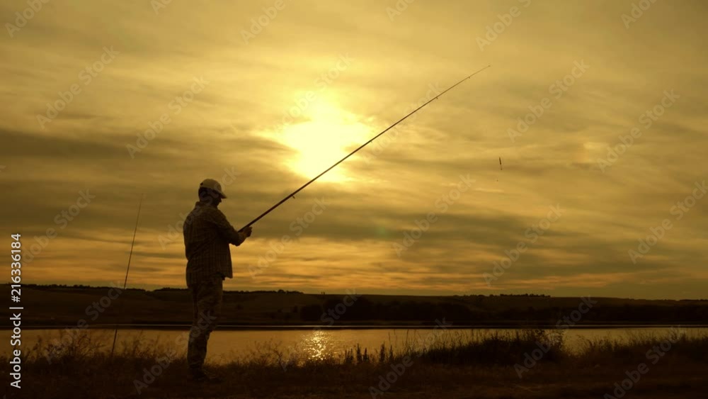 Silhouette of man enjoying fishing with beautiful sunset. Silhouette of man enjoying fishing with beautiful sunset.