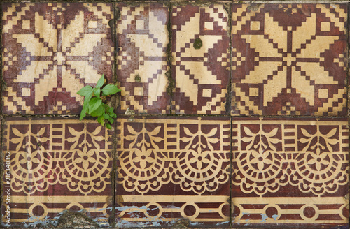 Traditional Portuguese azulejo tiles on the building in Porto, Portugal.