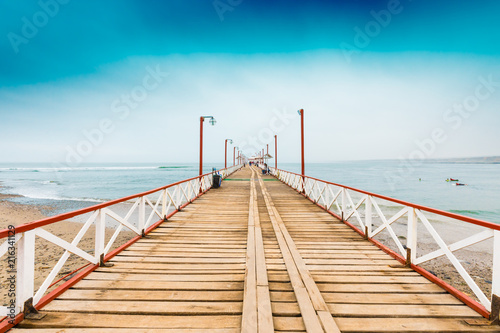 wooden pier Pimentel Peru beach