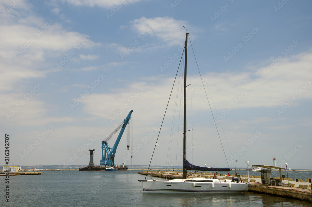 Yacht in the Black Sea port. Privatrovana in the harbor. Yacht in the Black Sea port. Privatrovana in the harbor.
