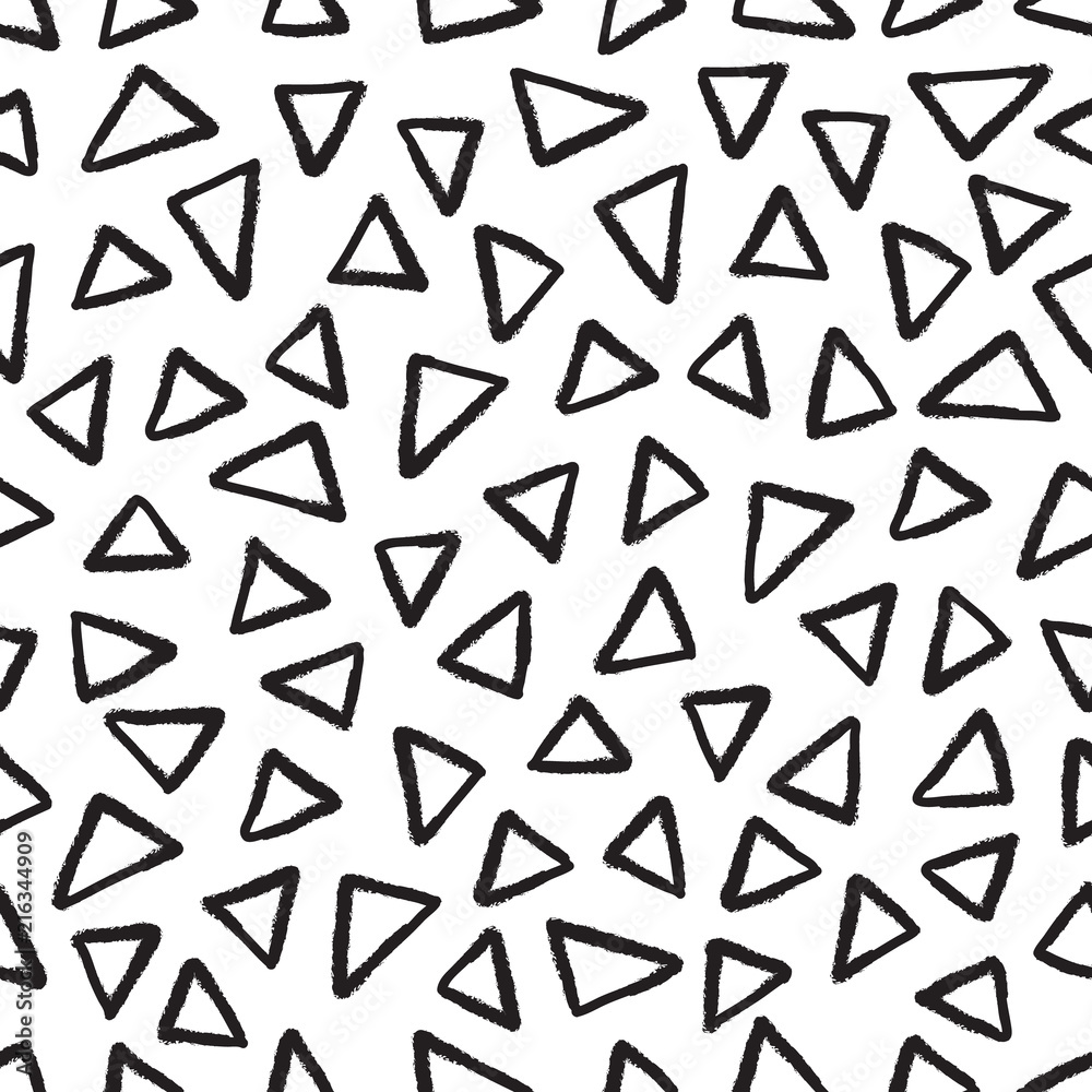 Abstract seamless black and white pattern of hand drawn doodle triangle elements. Scandinavian design style. Vector illustration for textile, backgrounds etc