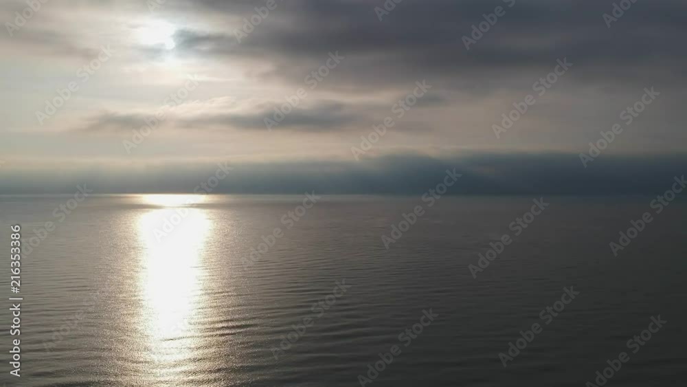 A cloudy start to the day with the sun trying to shine through, storm clouds are on the horizon.