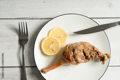 Fototapeta Naklejka Na Ścianę i Meble -  Roast duck leg on the wooden table
