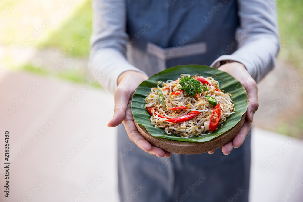 hand carrying indonesian food