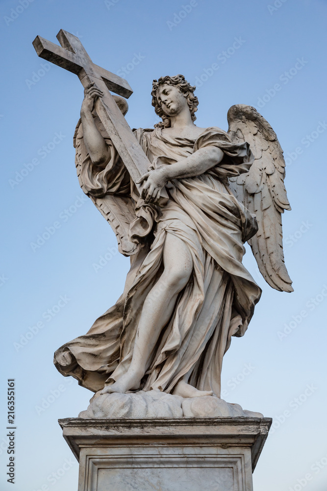 Angel with the cross sculpture by Ercole Ferrata on the Pont Sant'Angelo bridge in Rome