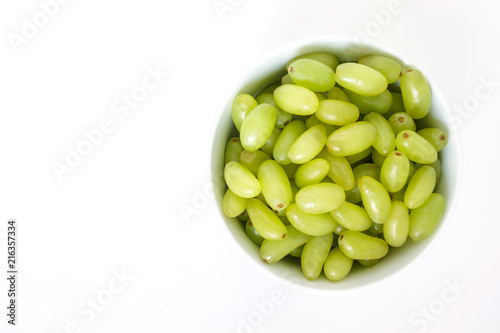 green grape in bowl diet fruit organic on white background