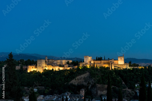 The magnificient Alhambra of Granada, Spain. Alhambra fortress at sunset viewed from Mirador de San Nicolas.