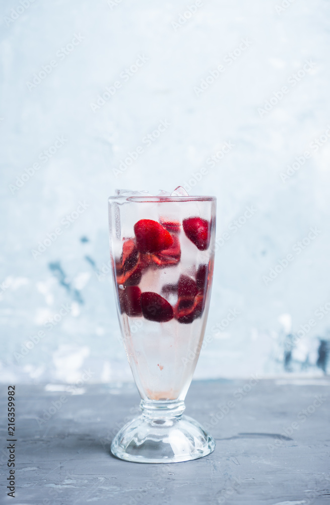 Cold cherry cocktail with ice and strong alcohol. Selective focus. Cold cherry cocktail with ice and strong alcohol. Selective focus.