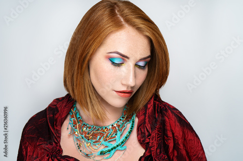 woman orange hair bob