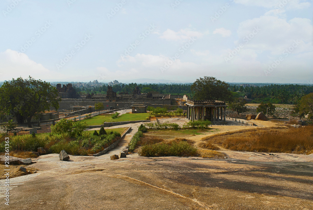View from Hemkuta Hill, Hampi, Karnataka. Sacred Center. Krishna temple in the distance on the left and Sasivekalu Ganesha temple on the right side is seen.