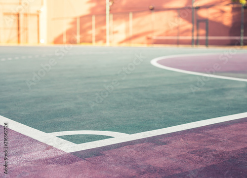 It's front view and low angle of a sports court in the sunset. A place to have a fun, competitions, recreations and play sports