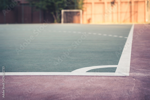 It's front view and low angle of a sports court in the sunset. A place to have a fun, competitions, recreations and play sports